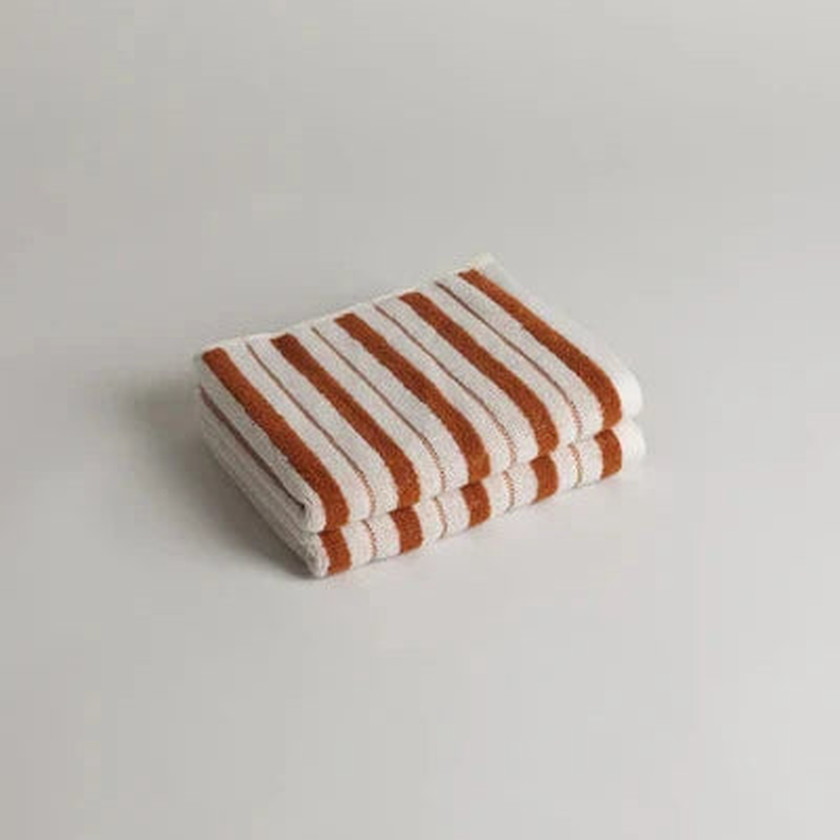 San Luis Hand Towel in Fuyu & Chalk by Baina